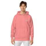 Motivated pigment-dyed hoodie (Unisex)
